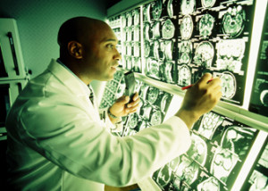 Doctor looking at MRI monitoring screen